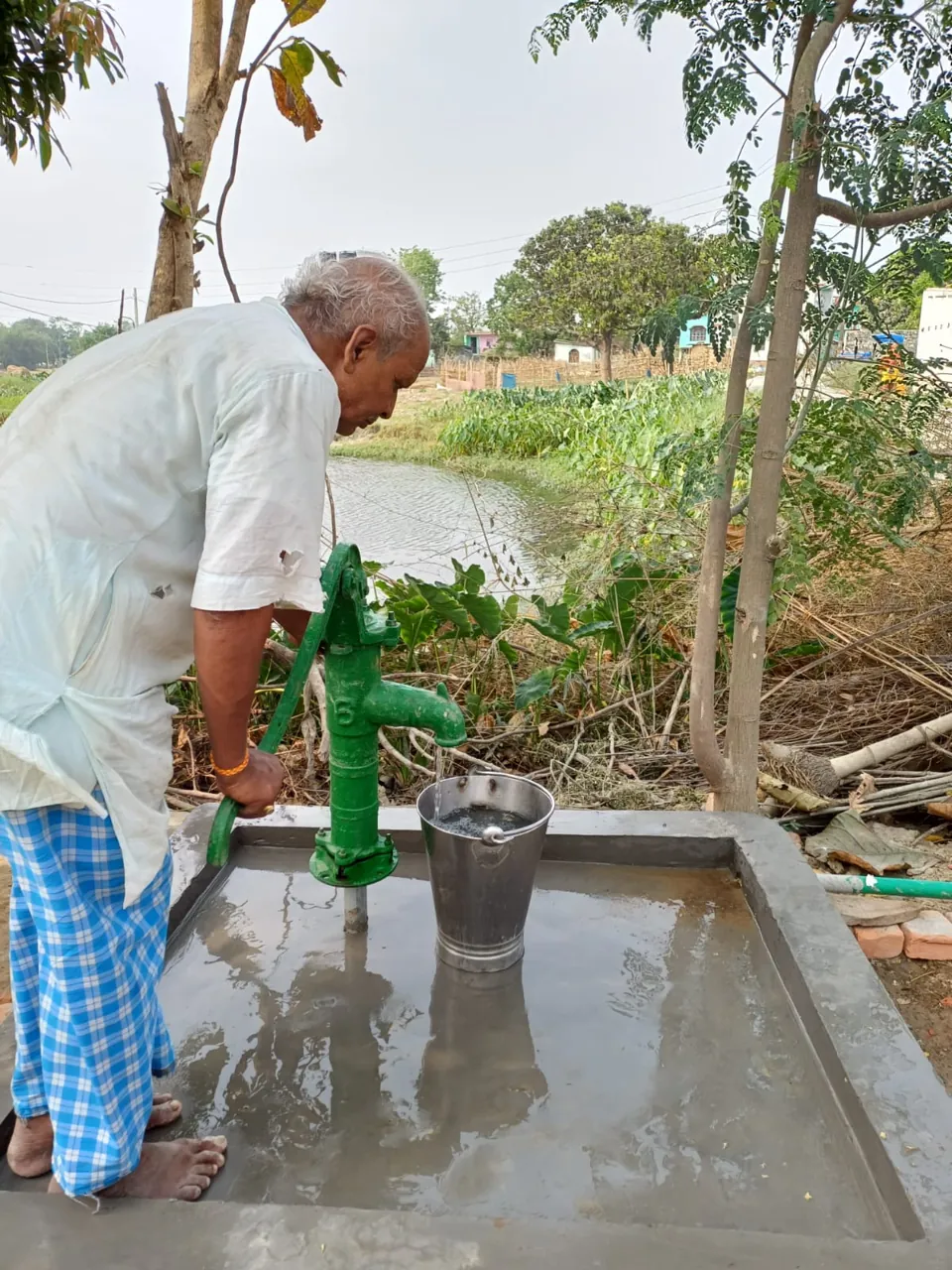 A local hand-pump water point
