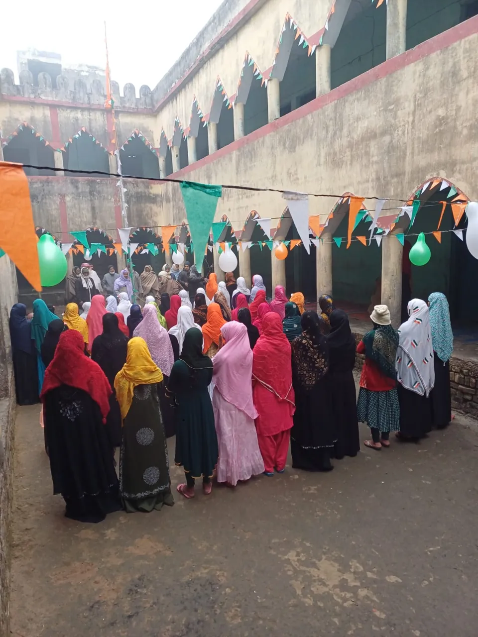 Community gathering with women and families